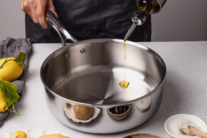 Cristel Castel'Pro sauterpanna i 18/10 rostfritt stål 5 lager fast handtag + glaslock