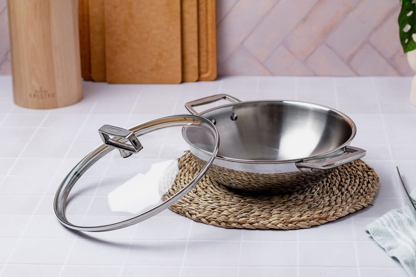 Wok Cristel Castel'Pro em aço inoxidável 18/10 de 3 camadas com 2 pegas fixas