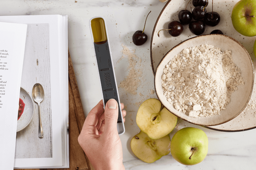 Joseph Joseph Measure-Up adjustable measuring spoon in blue polymer