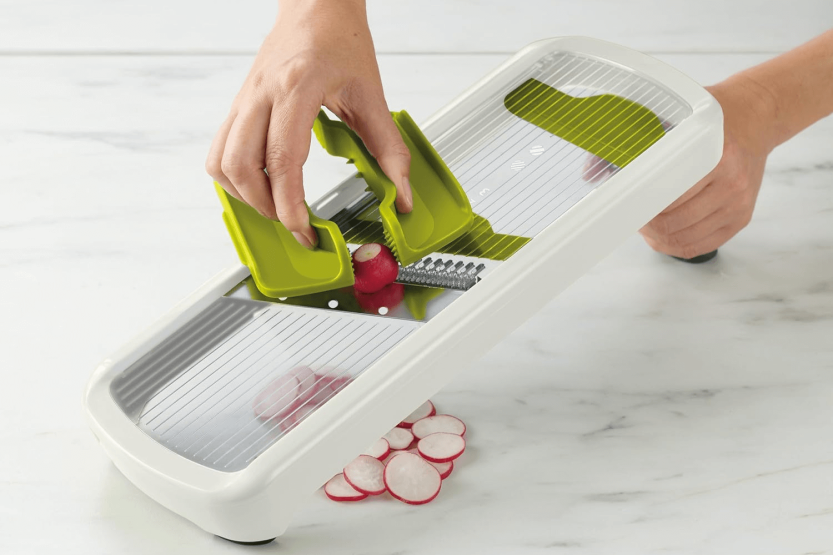 Kitchen mandolin Joseph Joseph Multi-Grip Plus with pusher and folding handle
