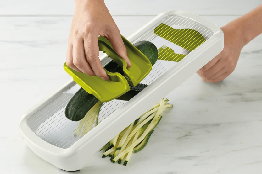 Kitchen mandolin Joseph Joseph Multi-Grip Plus with pusher and folding handle