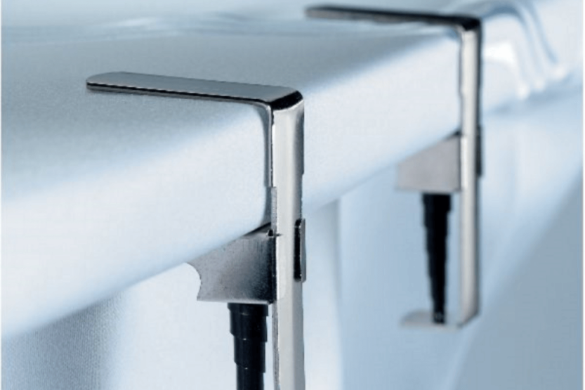 Conjunto de 4 grampos de toalha de mesa Gefu Fermo para mesas grossas