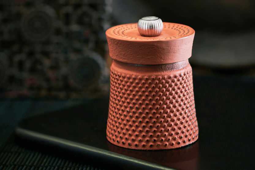 Peugeot Bali gietijzeren oranje handmatige pepermolen 8cm