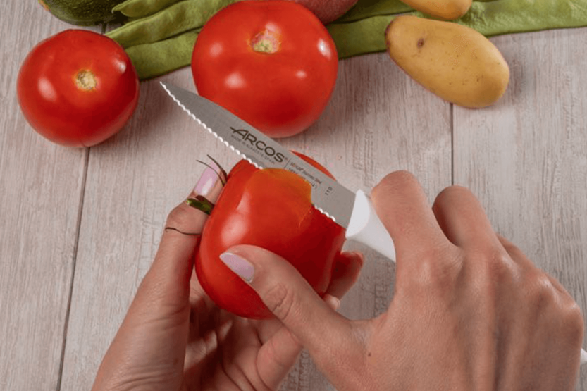 Arcos Nova schilmes Nitrum staal gekarteld lemmet 10cm wit handvat
