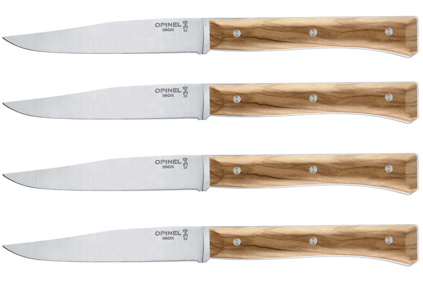 Set in scatola di 4 coltelli da tavola Opinel Facette con manico in legno d'ulivo e lama liscia in acciaio inox da 11 cm