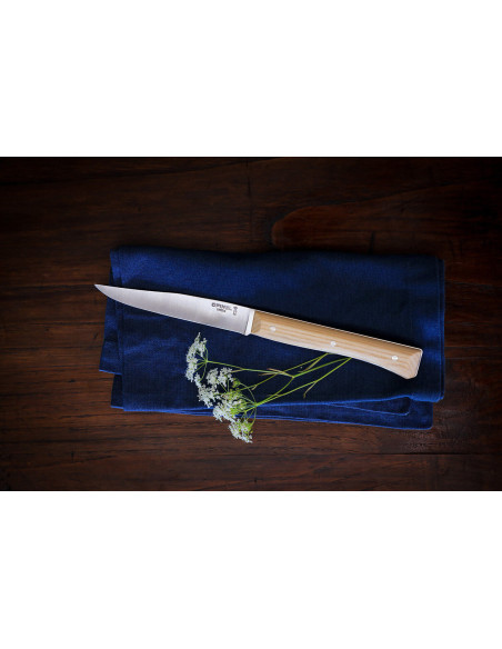Set in scatola di 4 coltelli da tavola Opinel Manico in frassino Facette Lama liscia in acciaio inox da 11 cm