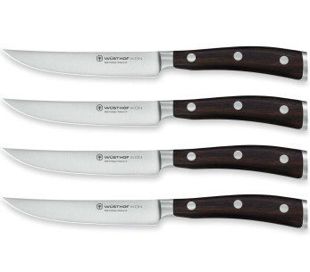 Set di 4 coltelli da bistecca forgiati Wüsthof Ikon da 12 cm con manici in legno di grenadilla