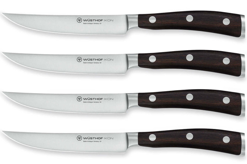 Set di 4 coltelli da bistecca forgiati Wüsthof Ikon da 12 cm con manici in legno di grenadilla
