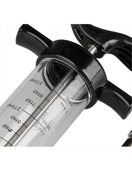 Ergonominen kastikeruisku, jossa on 7,5 cm:n ruostumattomasta teräksestä valmistettu neula.