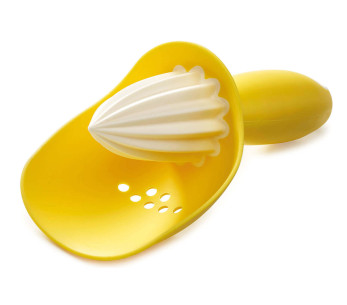 Exprimidor Joseph Joseph Catcher amarillo con recogedor de semillas