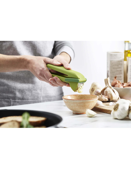 Joseph Joseph CleanForce green garlic press with wiper blade
