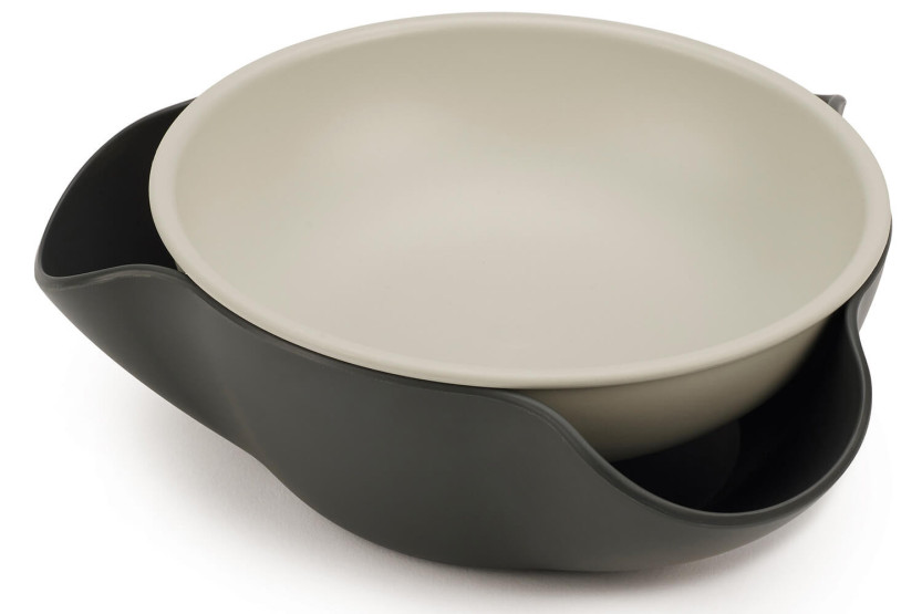 Joseph Joseph Double-Dish -tarjoilukulho, jossa on jätteiden keräysalusta