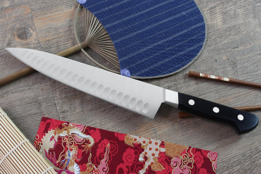 Misono UX10 24cm Japans koksmes met granton lemmet