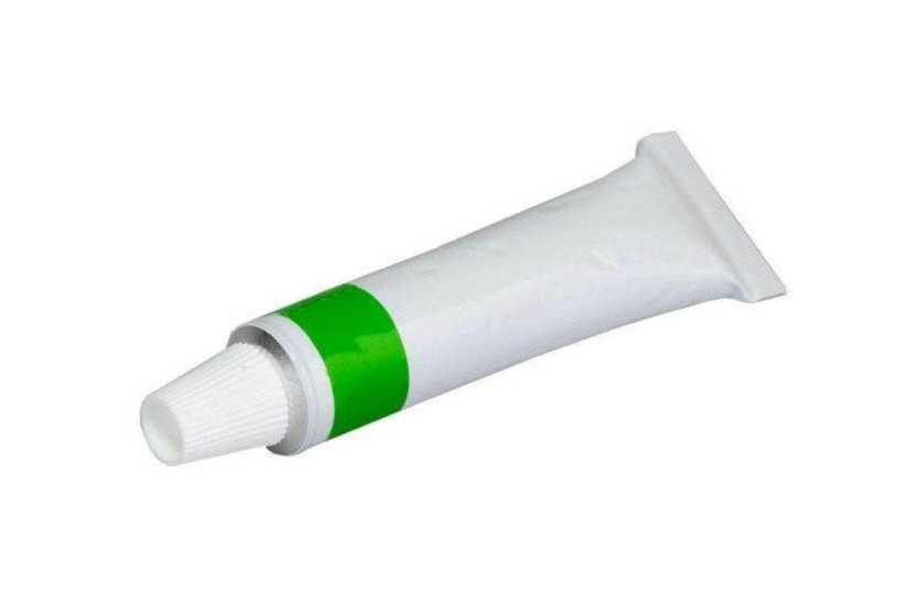 Tube of Herold razor paste for blade polishing