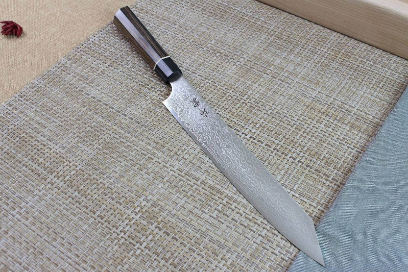 Kanetsugu Zuiun stål SPG2 damaskus 24 cm japansk sujihikikniv