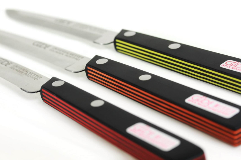 GÜDE Universal table knife 10cm micro-serrated black/yellow handle