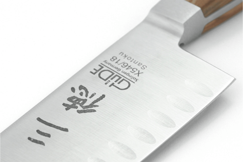 Güde Alpha Olive 18 cm con fossette coltello santoku in acciaio forgiato