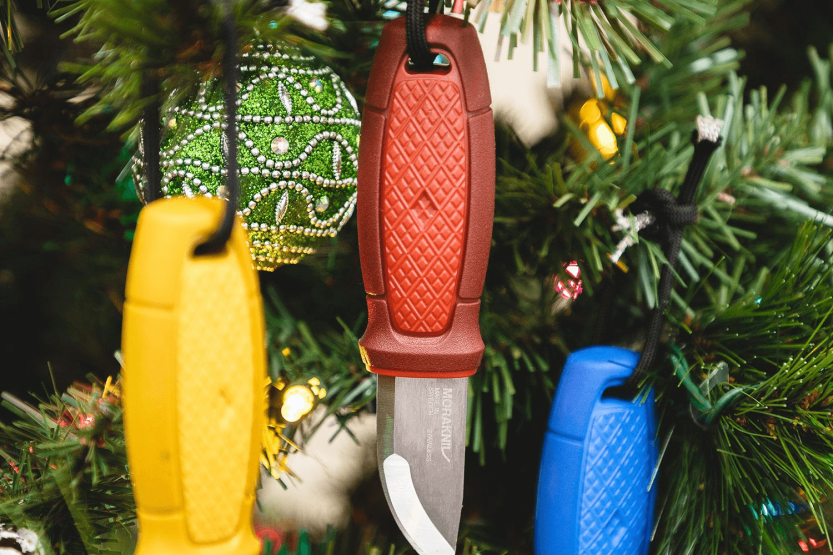 Mora Eldris 12630 taskuveitsi 5.9cm ruostumattomasta teräksestä valmistettu terä punainen kumikahva sytyttimellä + kotelo