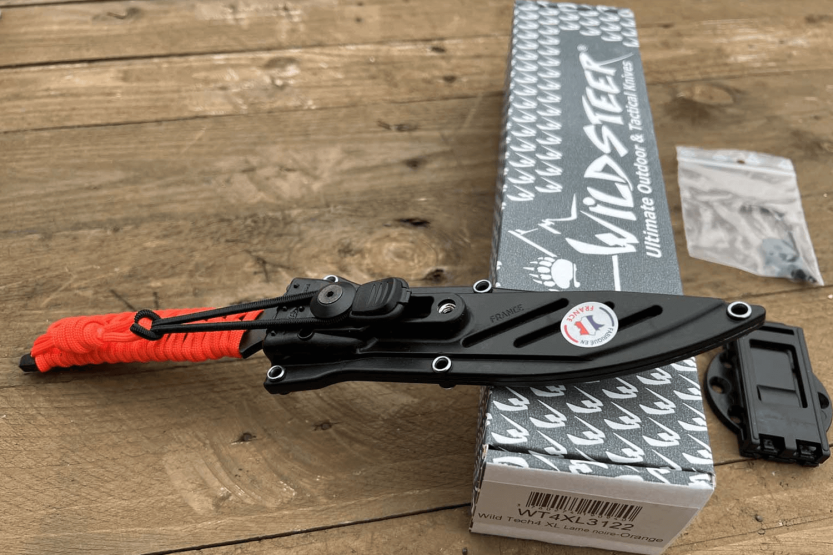 Faca Wildsteer Wild Tech4 XL WT4XL3122 Lâmina preta de 11,5 cm Cabo de paracord Fluo Orange + bainha POM
