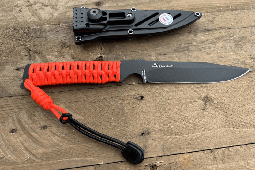 Wildsteer Wild Tech4 XL WT4XL3122 kniv 11,5 cm svart blad Fluo Orange paracordhåndtak + POM-kappe