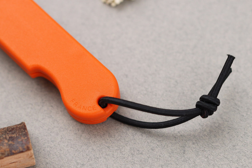 Skult Fransk fällkniv med ekologiskt ansvar 10cm orange handtag