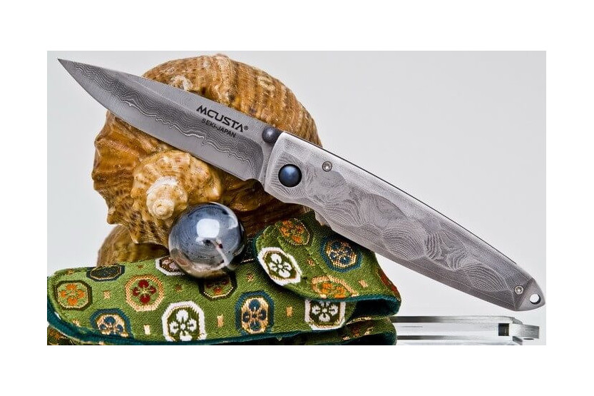 MCUSTA Tsuchi MC-34D Cuchillo plegable acero Damasco 66 capas 10cm + funda